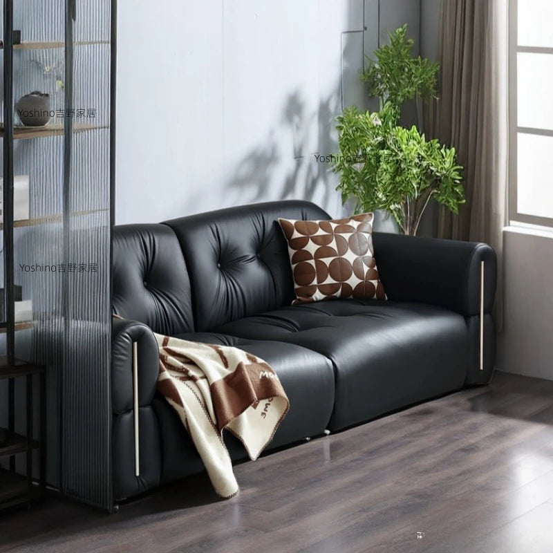 Black leather sofa small apartment living room big black cow