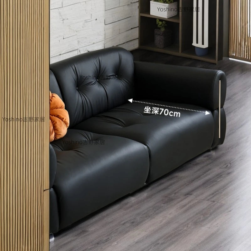 Black leather sofa small apartment living room big black cow