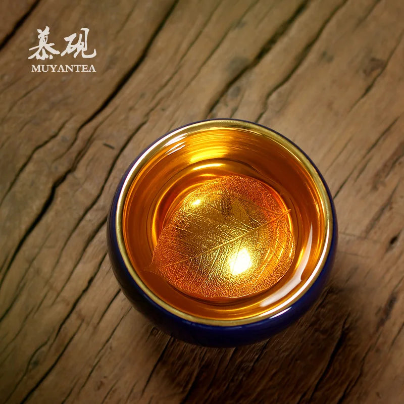 MuYan famous master Roy 24 k jinzhan masters cup by hand back to the blue and gold leaf lamp that pu 'er tea cups